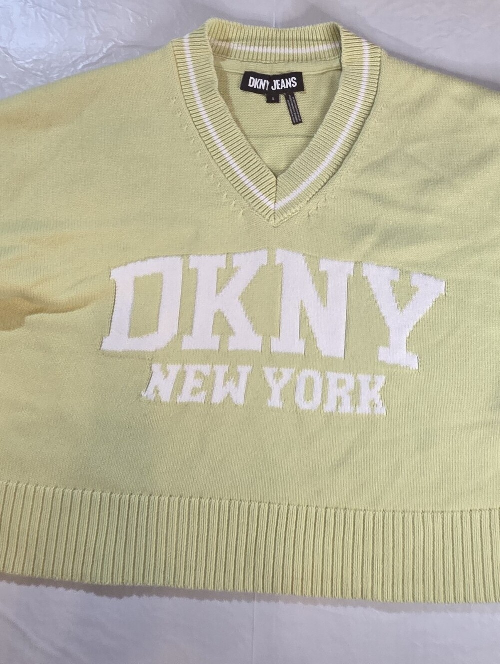 Dkny Pale Yellow V-Neck Logo Sweater with White Lettering